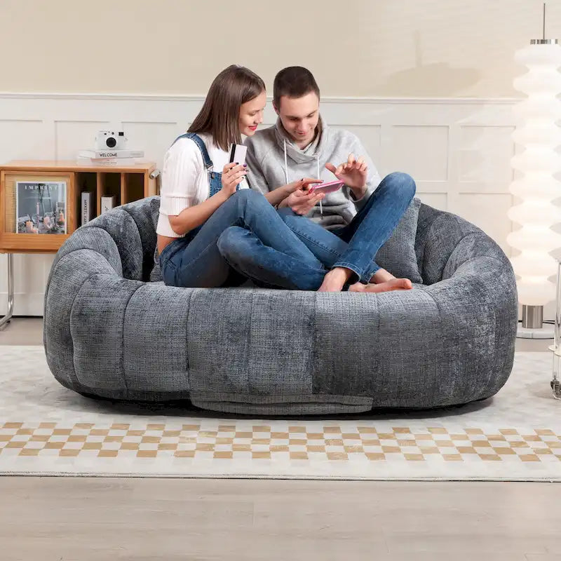 Canapé deux places moderne gris en chenille, chaise longue