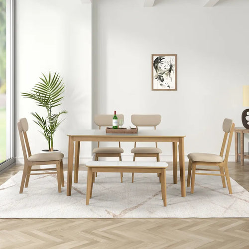 Ensemble de salle à manger rectangulaire 6 pièces avec 4 chaises rembourrées et un banc. Style moderne et décontracté.