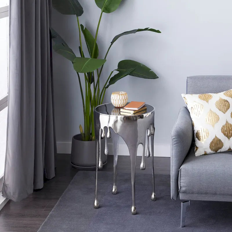 Table basse ou console décorative en aluminium effet goutte d'eau, pieds design effet fondu et plateau en verre teinté - Roche River Decor