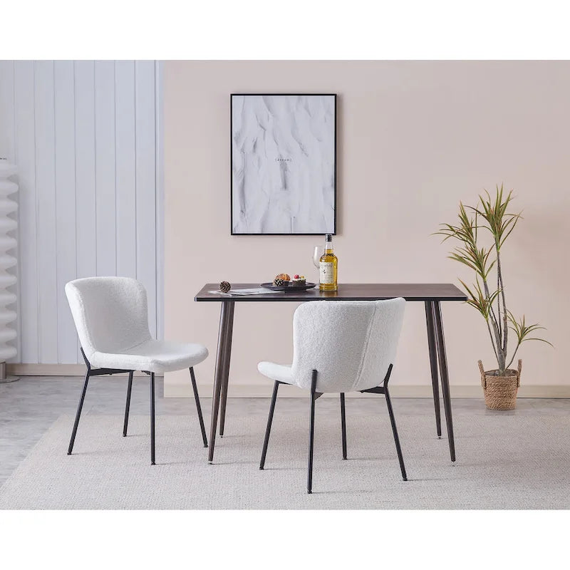 Ensemble de 2 chaises de salle à manger Porthos Home Lance, revêtues de tissu et dotées de pieds en acier.