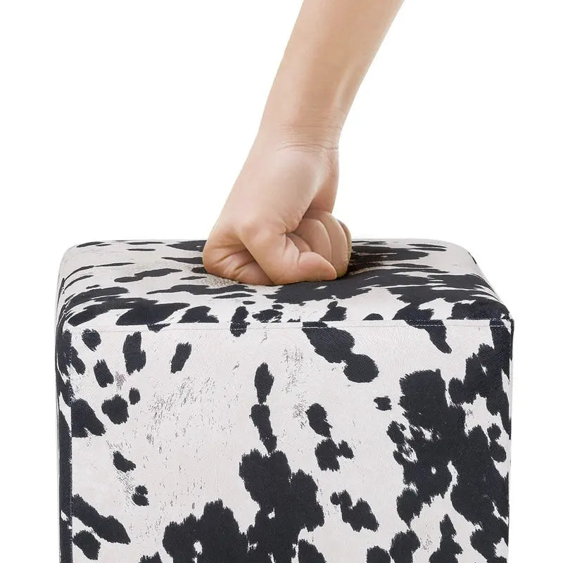 Pouf cube style britannique Adeco à motif vache, repose-pieds élégant