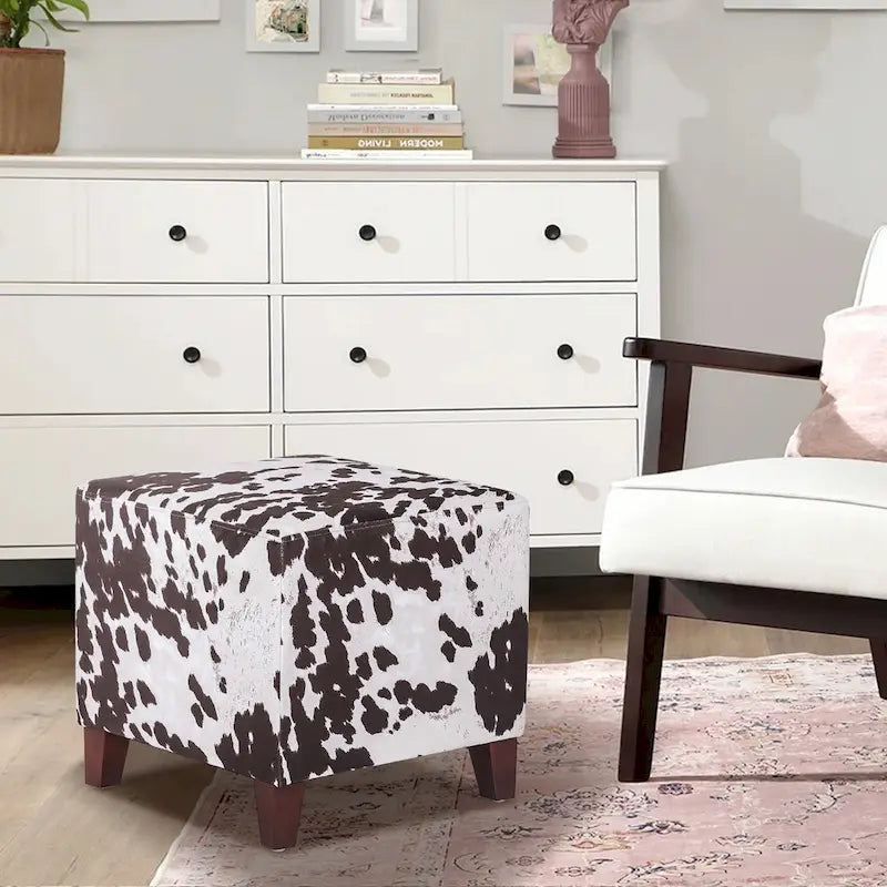 Pouf cube style britannique Adeco à motif vache, repose-pieds élégant