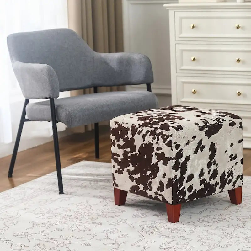 Pouf cube style britannique Adeco à motif vache, repose-pieds élégant
