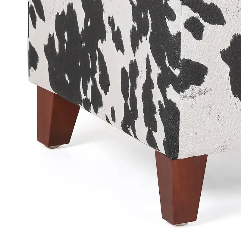 Pouf cube style britannique Adeco à motif vache, repose-pieds élégant