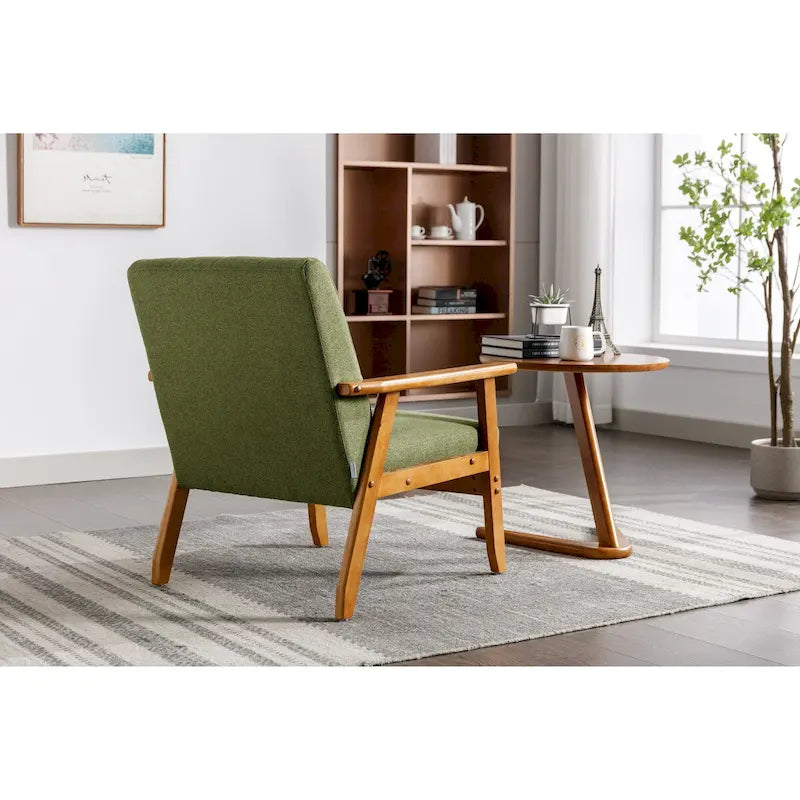 Fauteuil de détente avec accoudoirs et pieds en bois massif, idéal pour le salon, la chambre ou un studio.