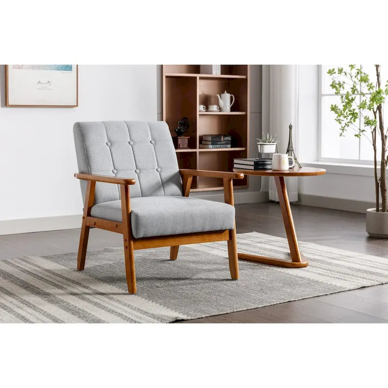 Fauteuil de détente avec accoudoirs et pieds en bois massif, idéal pour le salon, la chambre ou un studio.