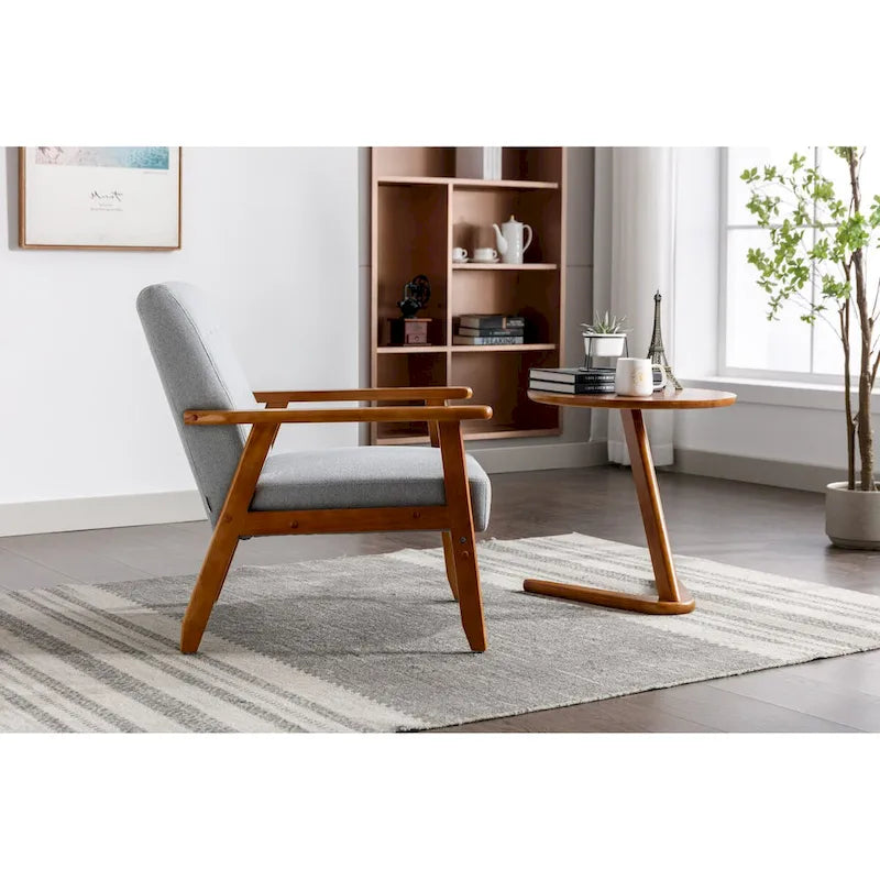 Fauteuil de détente avec accoudoirs et pieds en bois massif, idéal pour le salon, la chambre ou un studio.