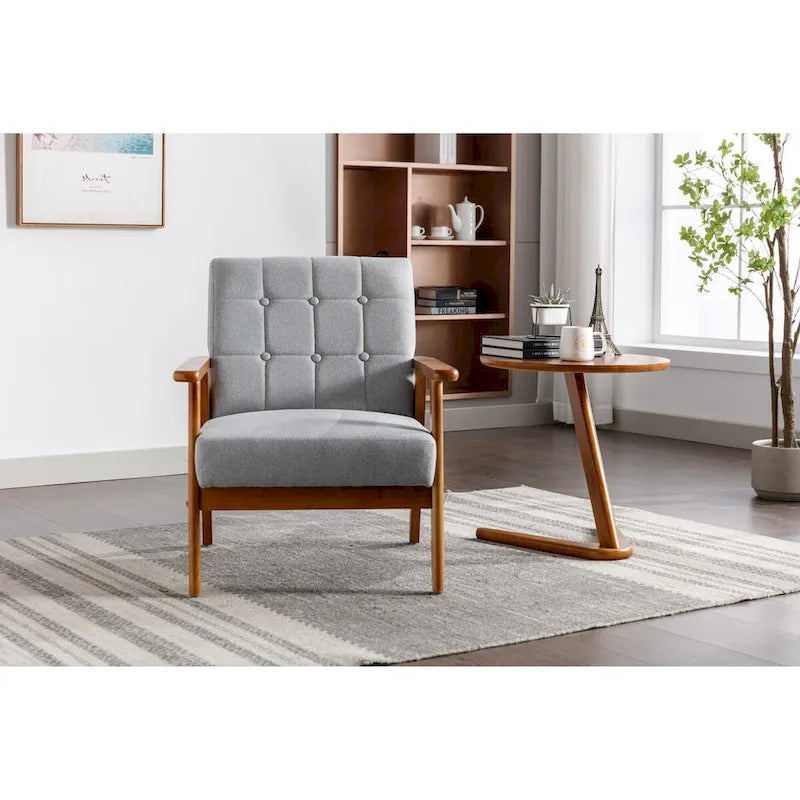 Fauteuil de détente avec accoudoirs et pieds en bois massif, idéal pour le salon, la chambre ou un studio.
