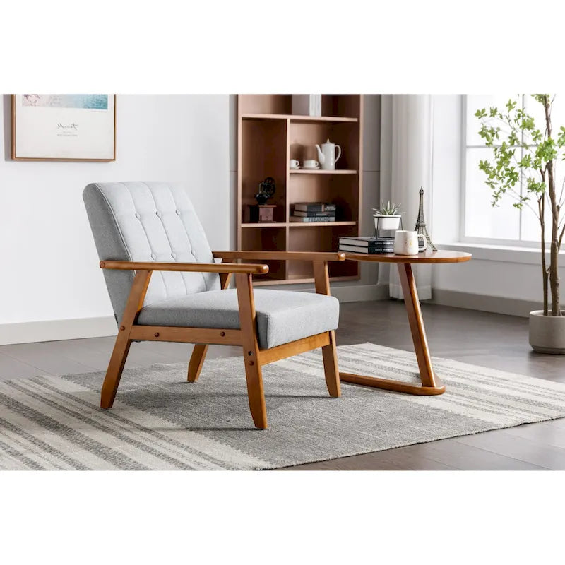 Fauteuil de détente avec accoudoirs et pieds en bois massif, idéal pour le salon, la chambre ou un studio.